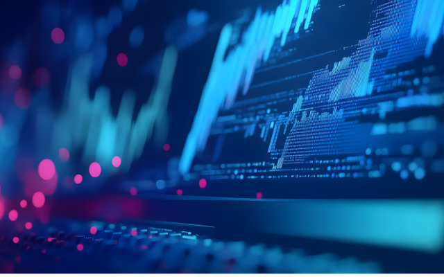 Close-up of a screen showing data charts and analytics dashboards
